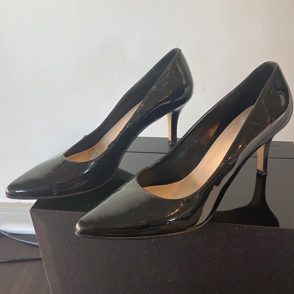 Black patent leather pumps